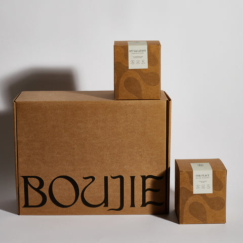 Boujie Be Present and Unclouded soy jar candles in sustainable gift box with shredded kraft paper. Boujie Be Present and Unclouded soy jar candles in sustainable gift box with shredded kraft paper.
