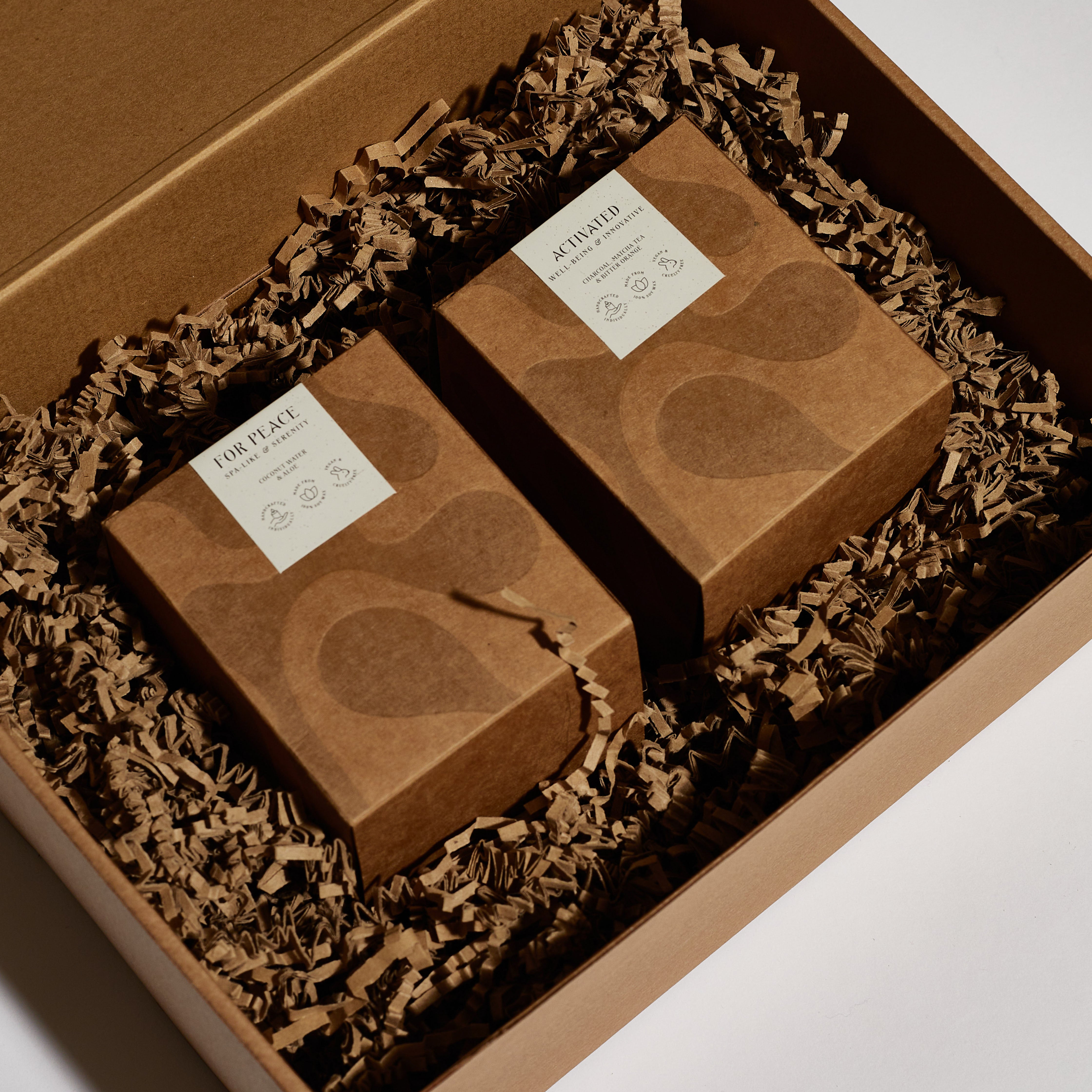 Boujie For Peace and Activated soy jar candles in branded eco-friendly gift box with shredded paper. Boujie For Peace and Activated soy jar candles in branded eco-friendly gift box with shredded paper.