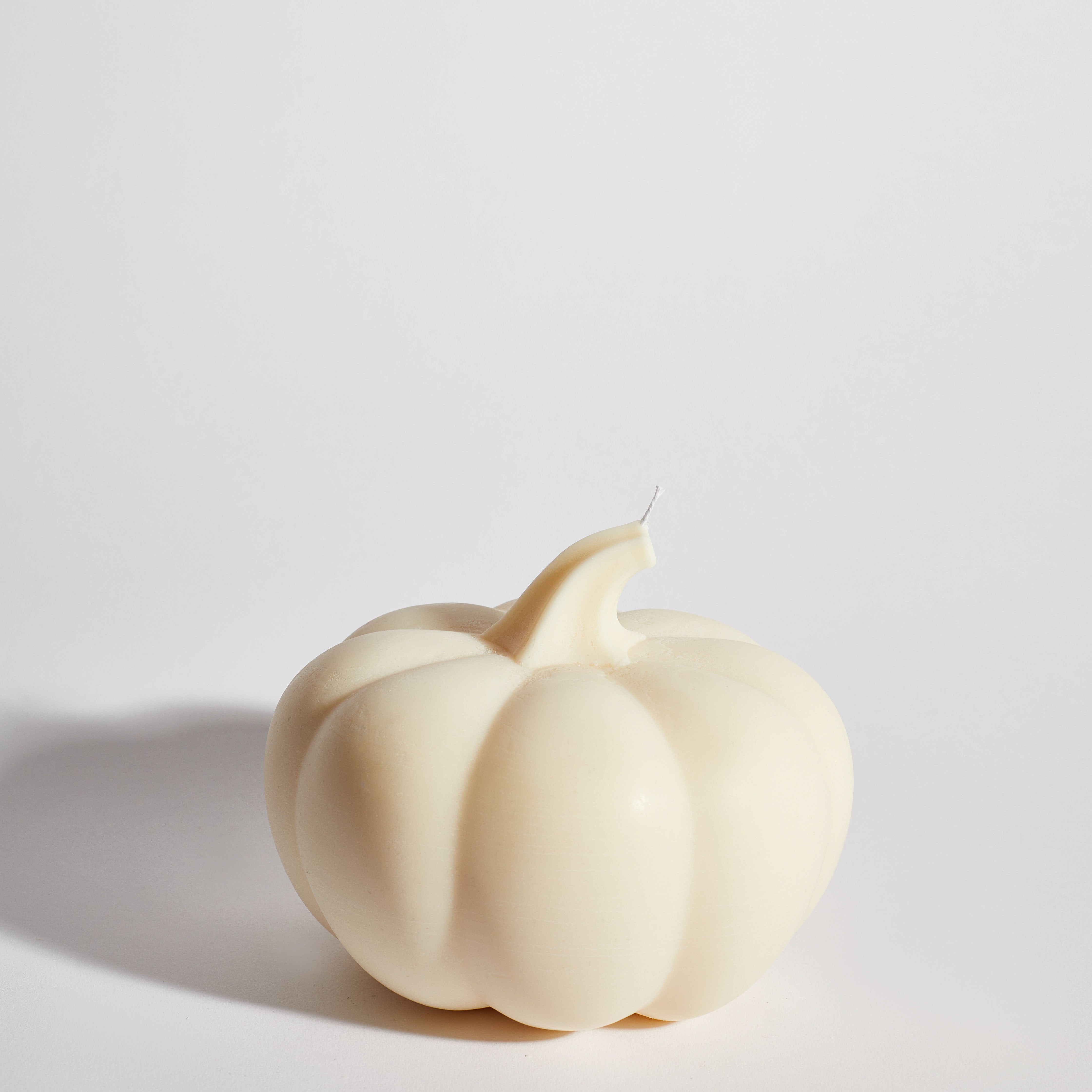 Boujie Life Size Pumpkin Decorative Candle, front view in creamy soy wax with realistic pumpkin design. Boujie Life Size Pumpkin Decorative Candle, front view in creamy soy wax with realistic pumpkin design.