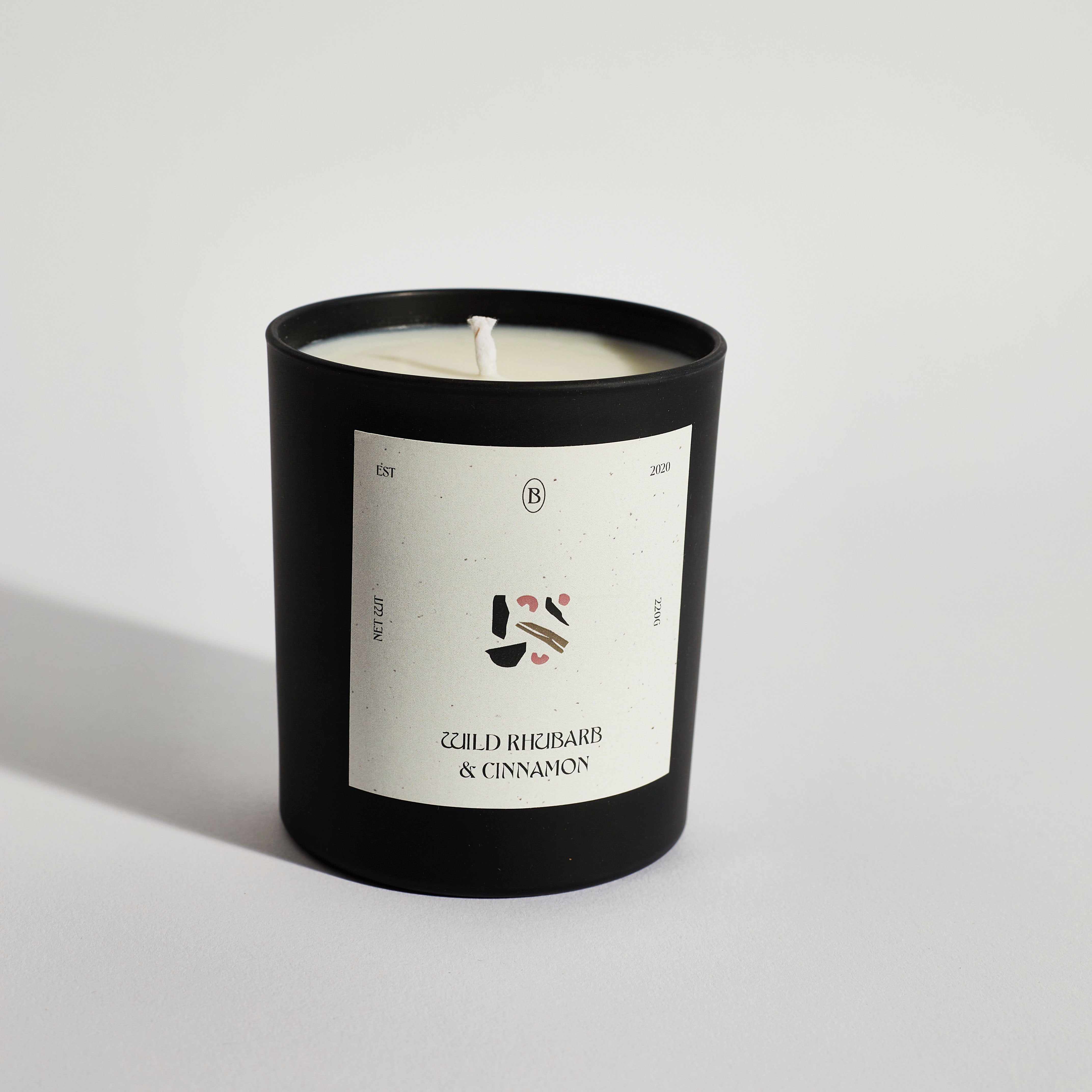 Boujie wild rhubarb and cinnamon black jar candle, handmade with natural soy wax – side view Boujie wild rhubarb and cinnamon black jar candle, handmade with natural soy wax – side view