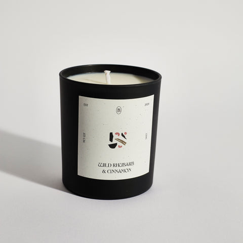 Boujie wild rhubarb and cinnamon black jar candle, handmade with natural soy wax – side view Boujie wild rhubarb and cinnamon black jar candle, handmade with natural soy wax – side view