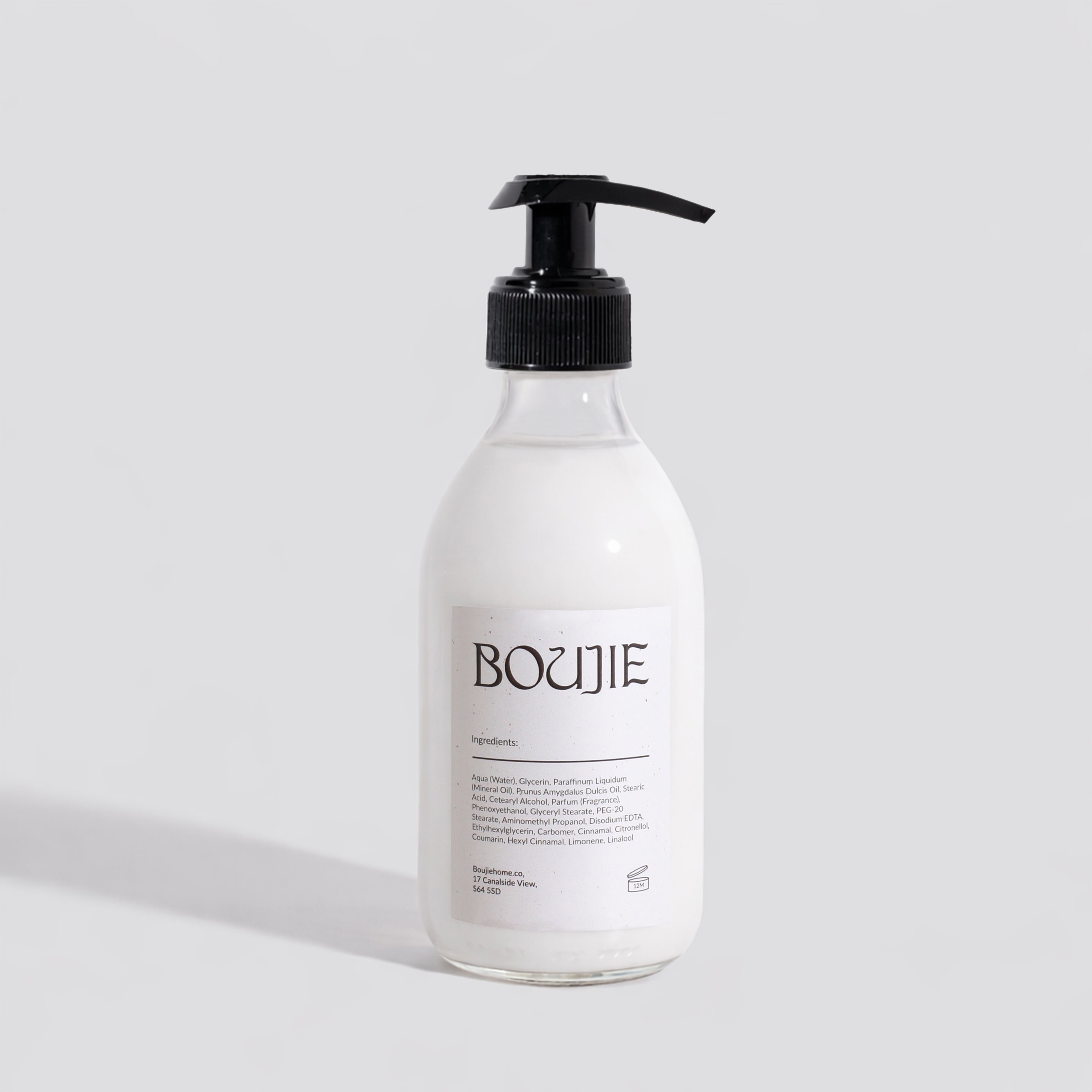Bottle of BOUJIE product on a light gray background