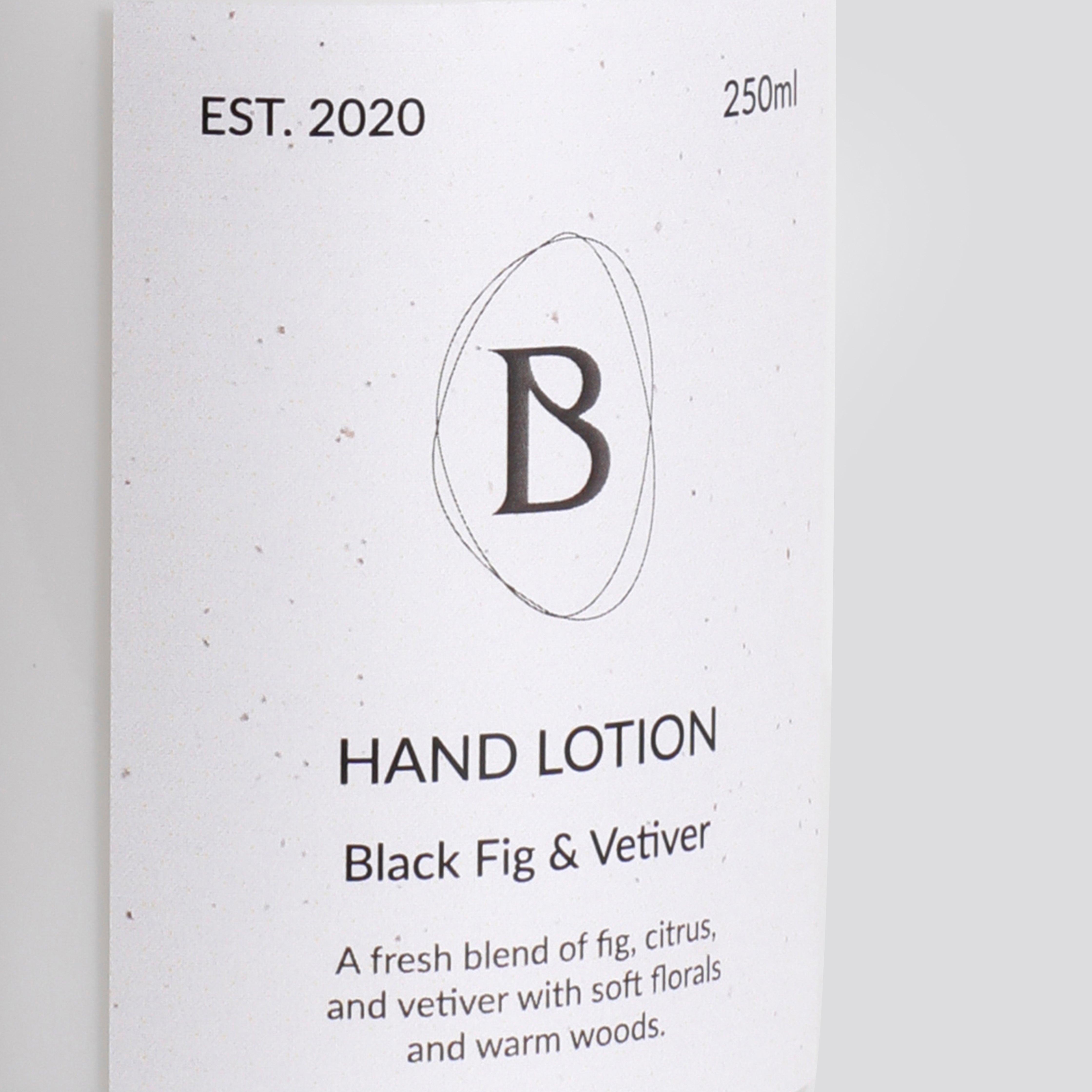 Hand lotion packaging with 'B' logo and product description on a white background