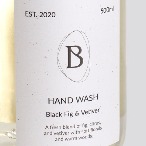 Hand wash bottle label with 'B' logo and product details on a white background