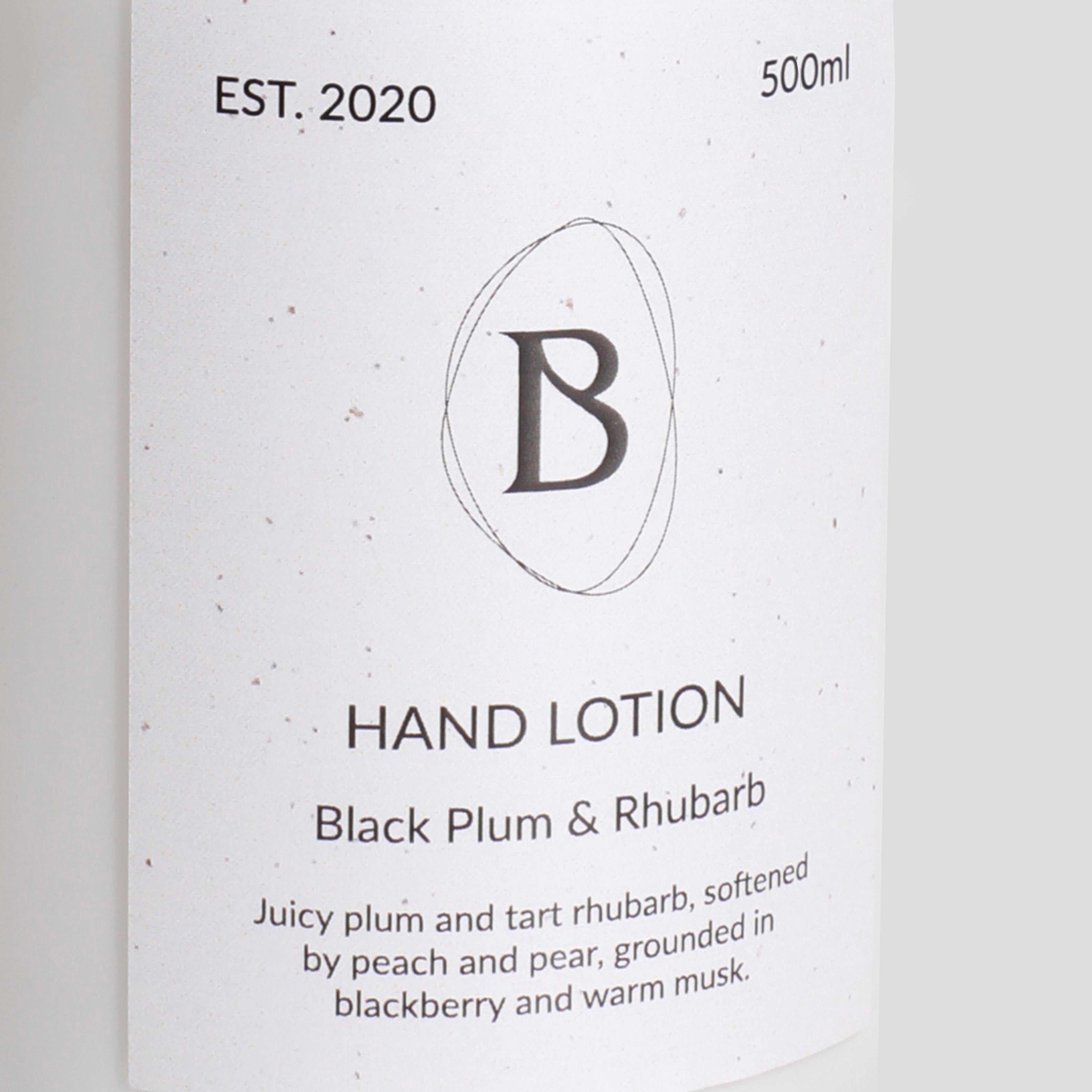 Hand lotion packaging with brand logo and product description on a white background