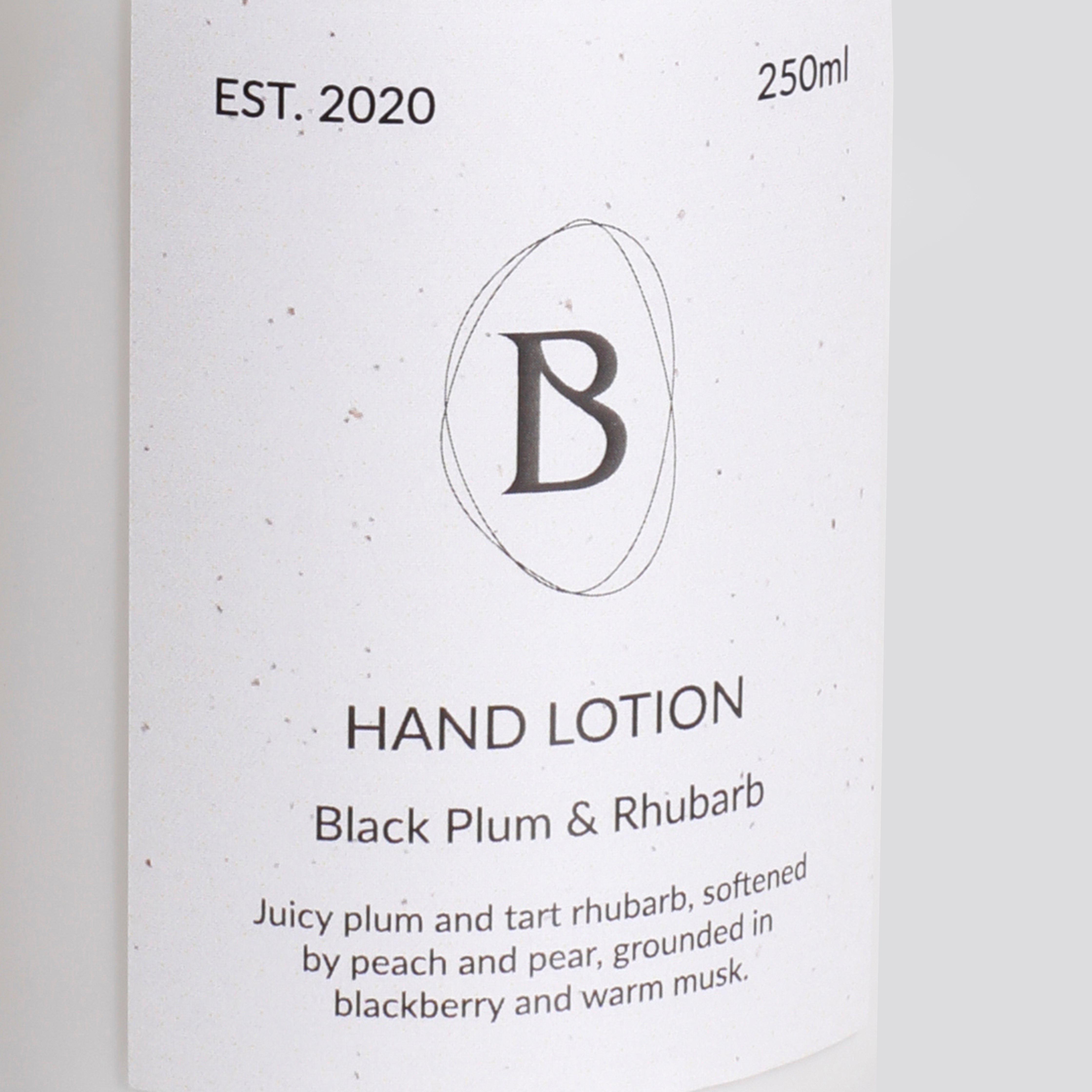 Hand lotion packaging with brand logo and product description on a white background