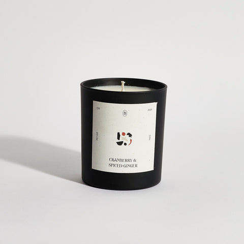 Boujie cranberry and spiced ginger jar candle, handmade with natural soy wax in a black jar – front view.