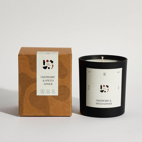 Boujie cranberry and spiced ginger jar candle with packaging, handmade from natural soy wax in a clear glass jar – front view.