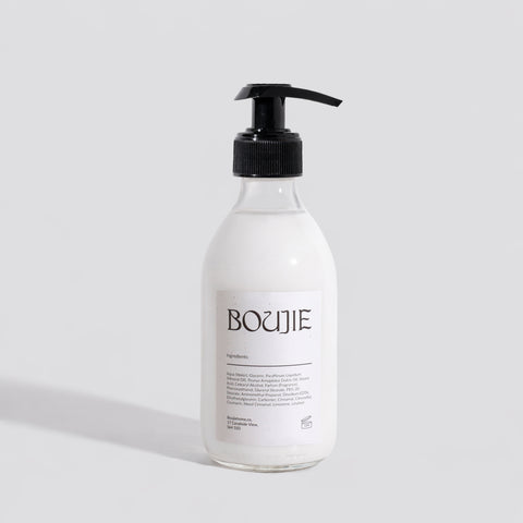 Bottle of BOUJIE product on a light gray background