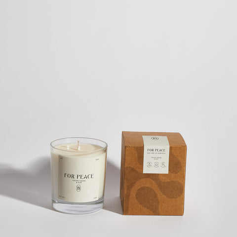 Boujie For Peace jar candle with elegant packaging, infused with citrus, aloe vera, and coconut for a calming, spa-inspired scent – front view.