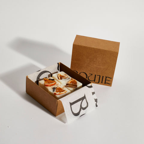 Handmade soy wax melts with dried orange and cinnamon in Boujie gift box.