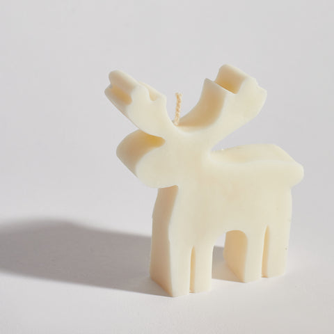 Reindeer decorative candle handmade from 100% natural soy wax in classic cream by Boujie Home Co.