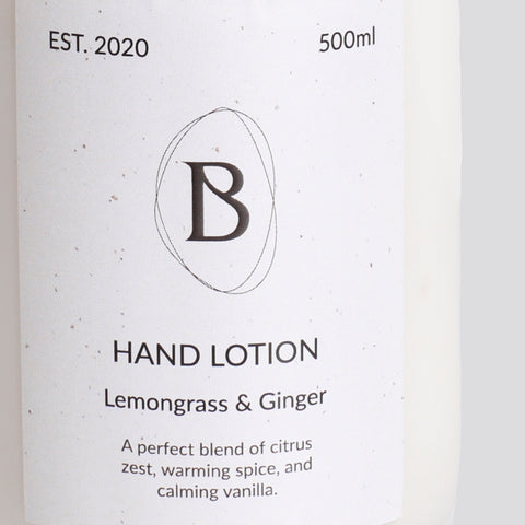 Hand lotion packaging with 'B' logo and product details on a white background