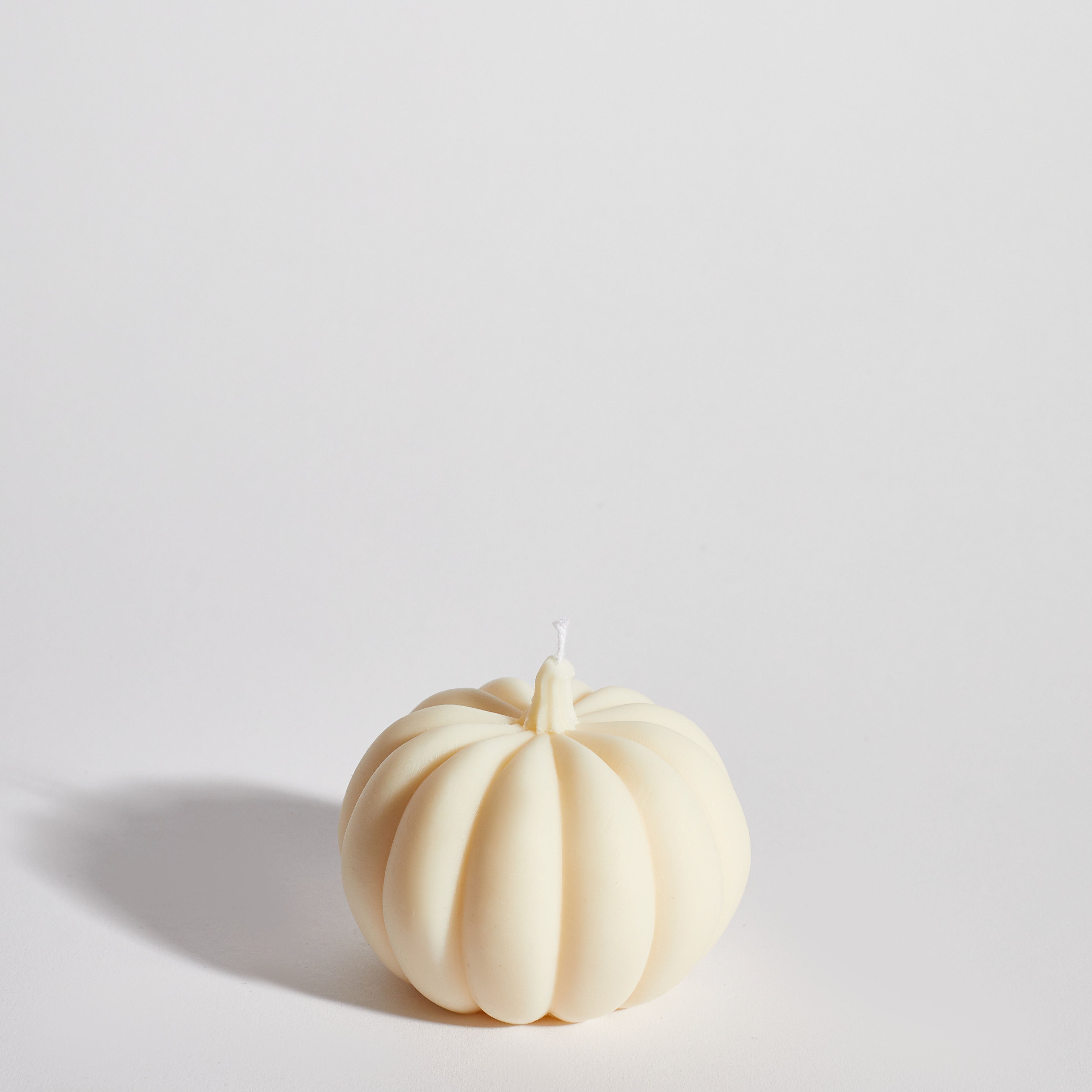 Boujie Medium Pumpkin Decorative Candle front view, handmade with natural soy wax in cream finish.