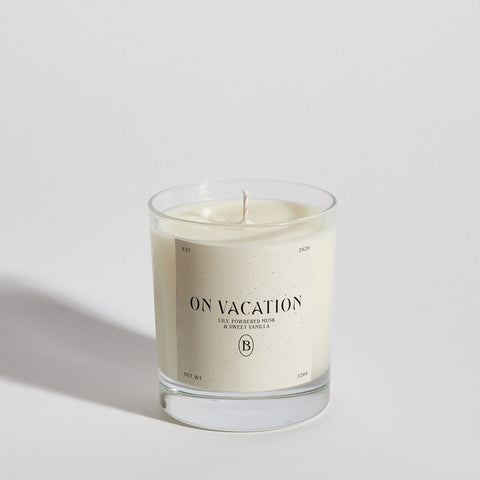 Boujie On Vacation scented jar candle front view, handmade with soy wax and infused with coconut, vanilla, lily, and powdered musk.