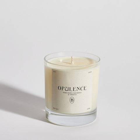 Boujie Opulence luxury soy wax jar candle, front view, handmade with natural soy wax in a clear glass jar, scented with dark honey, patchouli, and tobacco.