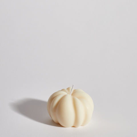 Boujie Small Pumpkin Decorative Candle, front view in creamy soy wax with pumpkin shape.