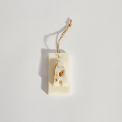 Personalised Christmas tree decoration with letter A, scented soy wax ornament decorated with dried botanicals.